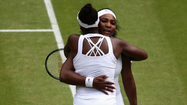 Serena Williams hugs sister Venus after their match.