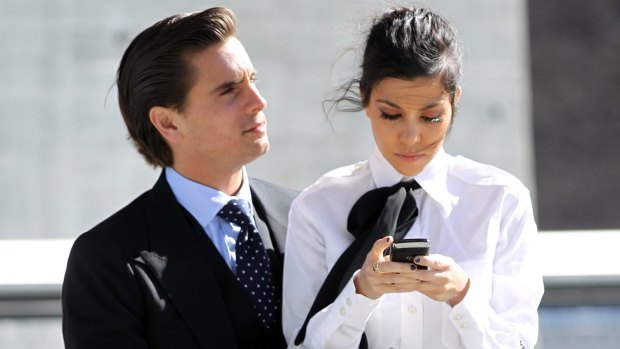 Scott Disick and Kourtney Kardashian, a modern couple who relied on mobile phones until they reportedly split this week. 