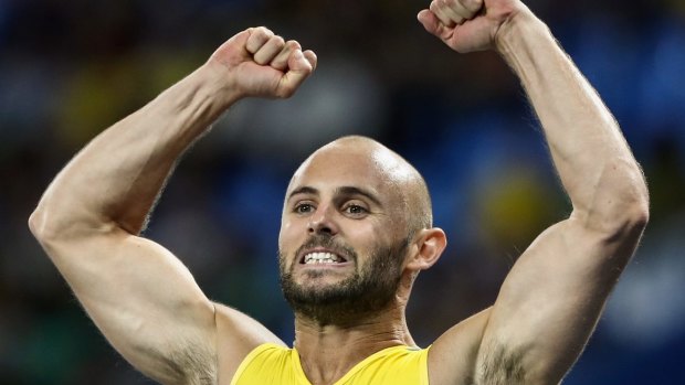 Temora's latest sporting hero: Scott Reardon celebrates winning the gold medal in the men's 100 metres T42 final.