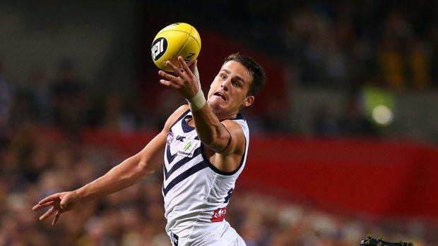 Harley Balic of the Dockers marks the ball during the round six AFL match.
