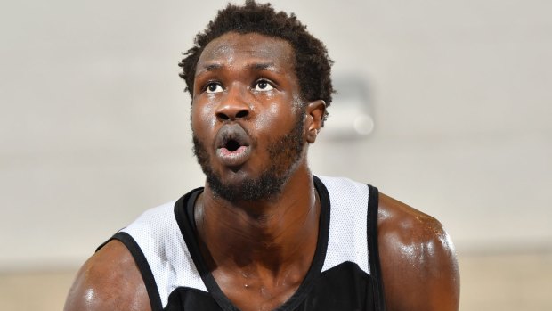 Determined: Australia's Mangok Mathiang  shoots a free throw for the Charlotte Hornets during the NBA Summer League. 