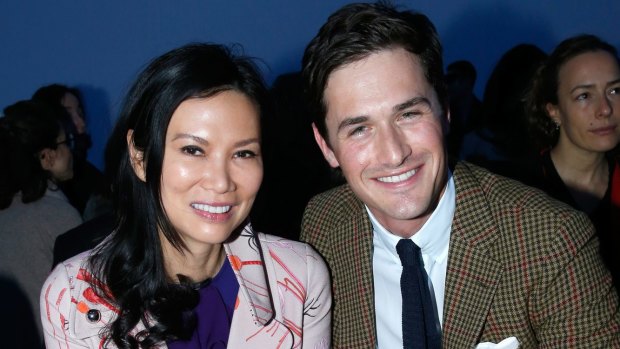 Wendi Deng Murdoch at the Giambattista Valli show with violinist Charlie Siem during Paris Fashion Week.