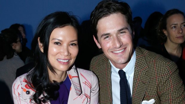 Wendi Deng Murdoch at the Giambattista Valli show with violinist Charlie Siem during Paris Fashion Week.