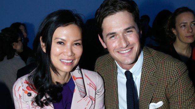 Wendi Deng and violonist Charlie Siem attend the Giambattista Valli show as part of the Paris Fashion Week. 