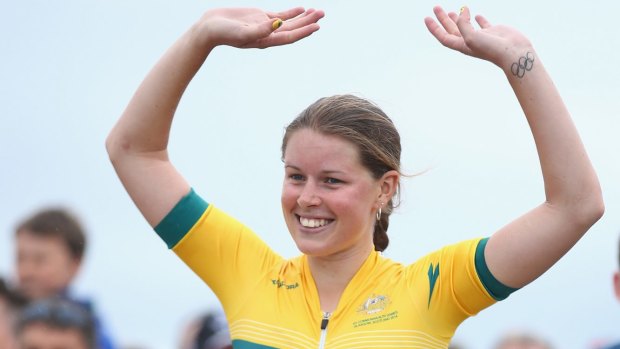 Canberra cross-country rider Rebecca Henderson celebrates her first World Cup podium in Cairns.