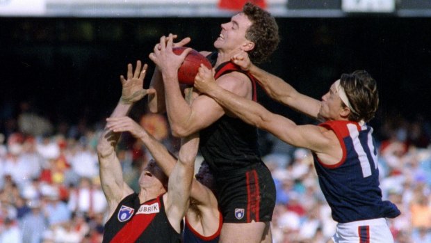 Photosales website

Essendon versus Melbourne.   Paul Salmon outmarks Terry Daniher ans Todd Viney.   Photo by Darrin Braybrook.   Published 26-4-1992.   From hardcopy file P: SALMON, Paul: ACTION