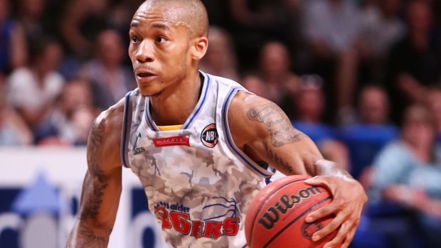 In the mix: Jerome Randle starred for Adelaide with 37 points.