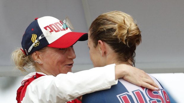 American gold medalist Cyclist Kristin Armstrong, right, hugs silver medalist Olga Zabelinskaya of Russia, after the women's individual time trial in Rio on Wednesday.