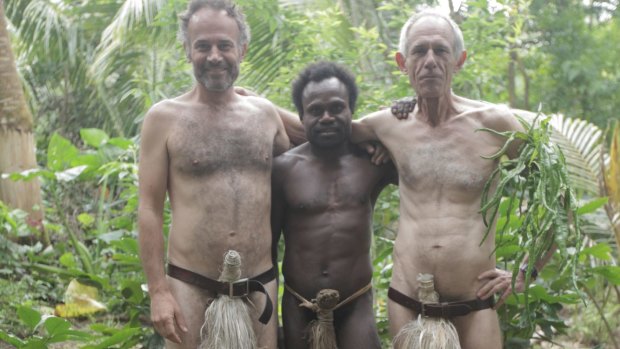 Traditional island dress: Tanna directors Bentley Dean (left) and Martin Butler with Lingai Kowia who appeared in the film. 