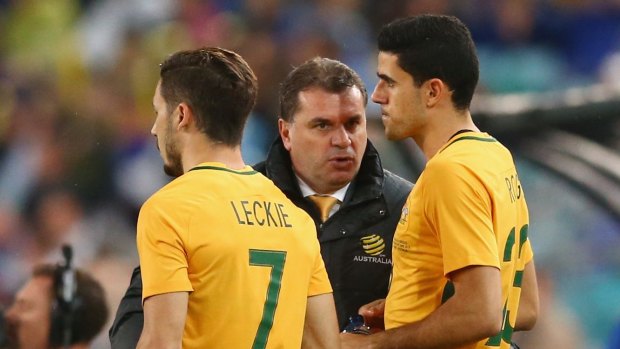 Ange Postecoglou has some words with young Socceroo Tom Rogic and Mathew Leckie.