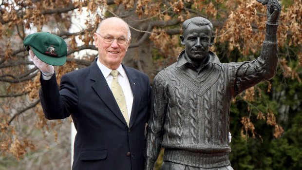 Former Austrlaian captain Ian Craig with the Don Bradman memorial statue at Bradman Oval, Bowral.