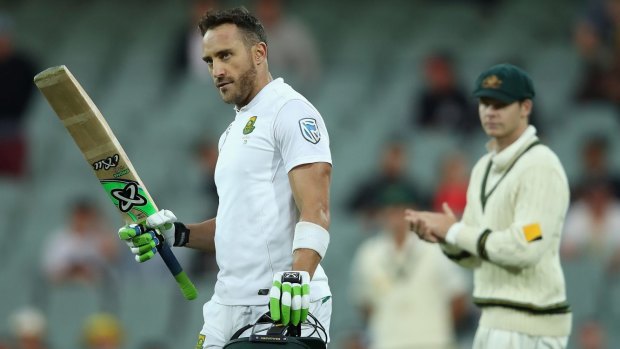 South African captain Faf du Plessis celebrates after scoring a century during day one of the Third Test match at Adelaide Oval.
