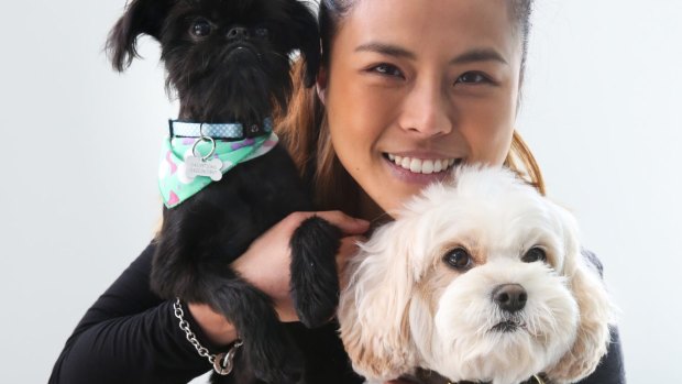 Vet  Dr Cherlene Lee and her dogs, (black dog) Obi-Wan-Kenobi and Siao Chuwho has twice needed treatment after eating chocolate.