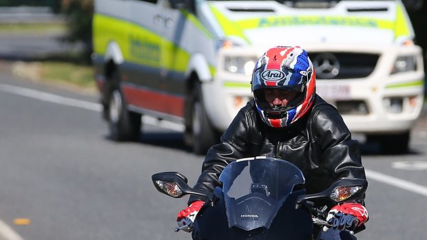 Mick Doohan rides during a road safety launch to call for an end to the carnage on Queensland roads.