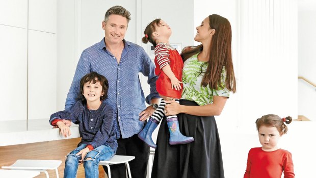 Fun parlour: Dave and Holly with their children Raff , 6, Tess, 3 and Sadie, 4