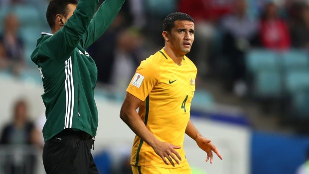Tim Cahill prepares to come on during the FIFA Confederations Cup match against Germany. 