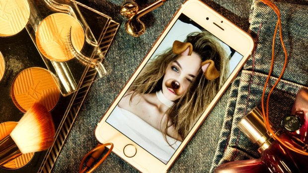 Vali Clarke and her selfie using Snapchat's dog-face filter: "(teenage girls') social media doesn't necessarily represent the way they actually are."