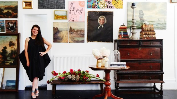 Natasha has lined the loungeroom walls with a mixture of art.“The spaces are embellished with my favourite items grouped into collections,” she says.