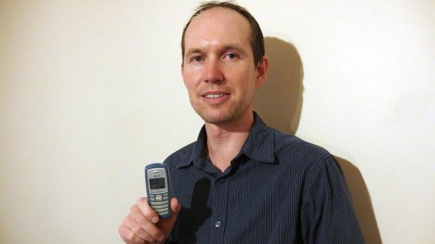 Small is all: Chris Woolmer has owned only one phone, a Nokia 2100 purchased in 2003.