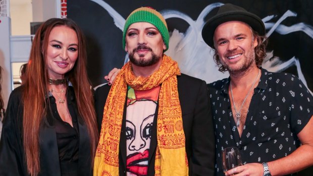 Franks with fiance JP Jones (R) and Boy George at Camilla's Bondi Beach Boutique in June.