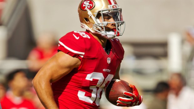 Jarryd Hayne picks up a step during drills before a game against the Dallas Cowboys.