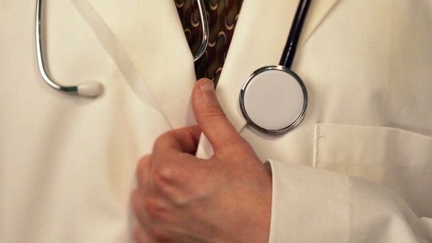 A doctor has successfully appealed his conviction for hogtying a child.
