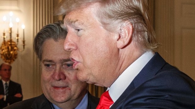 US President Donald Trump and then-White House chief strategist Steve Bannon in the State Dining Room of the White House in Washington in February. 