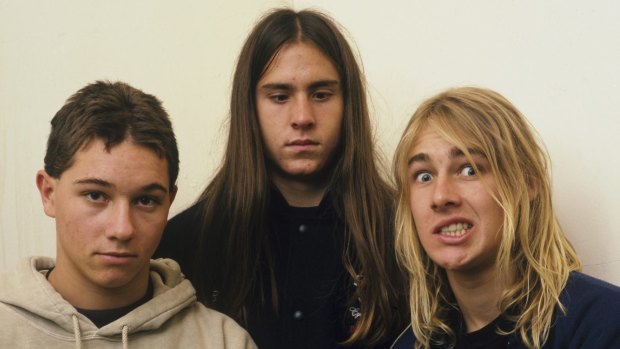 Boy to man: Johns (right) with fellow Silverchair members Chris Joannou and Ben Gillies, circa 1995.