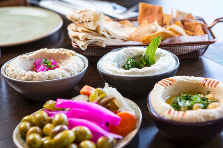 Dips, olives and pickles at Mama Manoush.