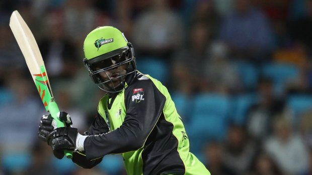 Something borrowed: Carlos Brathwaite had to use other cricketers' shoes, bats and gloves.