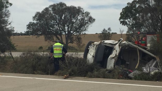 A 72-year-old woman died after her van and a truck collided south of Gunning on the Hume Highway on Thursday.