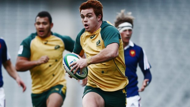 On the run: Andrew Kellaway in action against France.