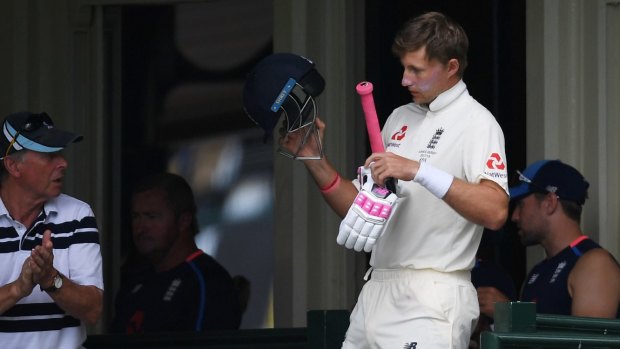 Another dig: Joe Root returns to the pitch after retiring injured.
