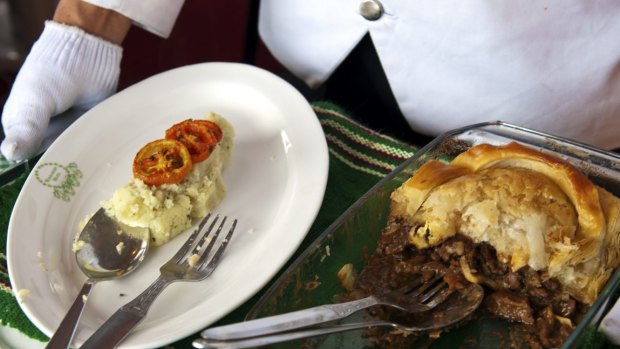 Old comforts: Steak and kidney pie with mashed potatoes and grilled tomatoes at the colonial-era Windamere Hotel in Darjeeling, India. 
