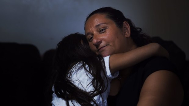 Joanna Karalis and her daughter. The mother of five has paid up to 50 per cent of her income a week in rent to live in Sydney. 