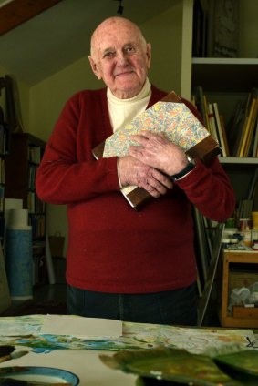 Australian artist John Olsen with the last of his journals which he is donating to the National Library.
