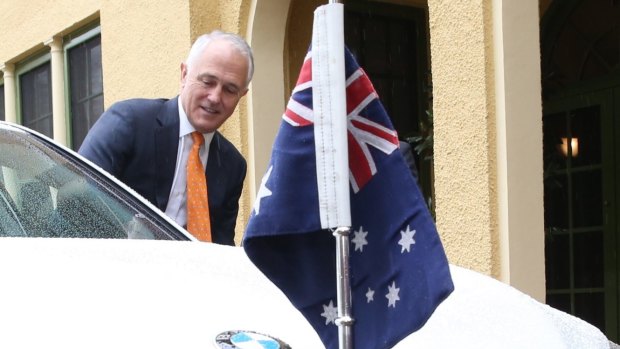 Prime Minister Malcolm Turnbull departs the Lodge to drive to Government House.