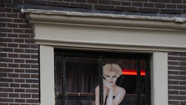 It wasn't quite business as usual as the capital's Red Light District emerged from coronavirus lockdown