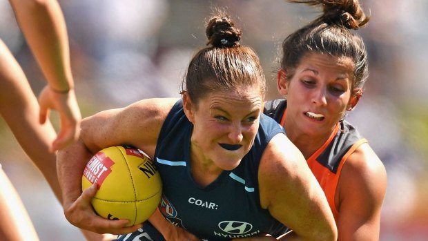 Shae Audley of the Blues is tackled by Jessica Dal Pos of the Giants during the round two AFL Women's match.