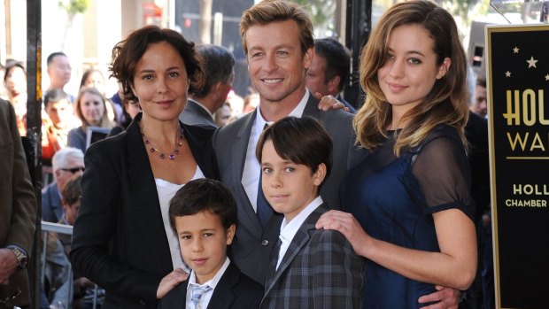 Simon Baker and wife Rebecca Rigg with daughter Stella and sons Harry, at left, and Claude, in Hollywood in 2013.