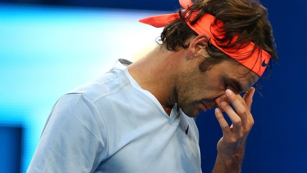 Roger Federer reacts after missing a shot against Alexander Zverev on Wednesday night.