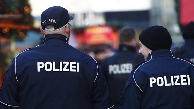 German police patrol a Christmas market  in Berlin last month.