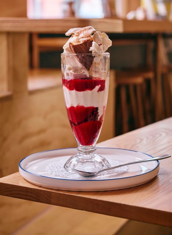 The knickerbocker glory sundae with vanilla ice-cream, meringue, raspberry sauce and fruit.