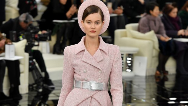 One suit, soft pink and textured with a matching hat, recalling former first lady Jacqueline Kennedy Onassis