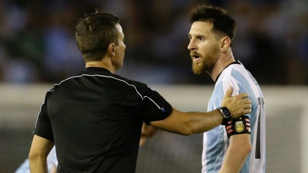 Lionel Messi, right, arguing with assistant referee Emerson Augusto de Carvalho during a 2018 Russia World Cup qualifying soccer match on March 23.