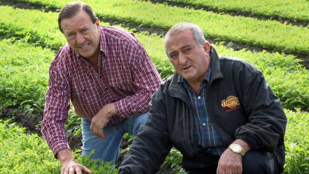 Lobster dinner host Frank Lamattina (right) with Liberal councillor Geoff Ablett at Mr Lamattina's farm.