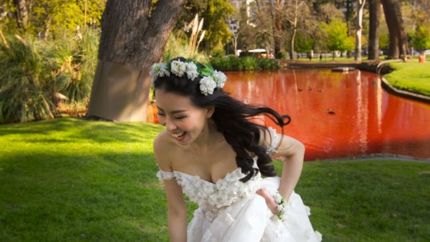 The lake proved a temporary tourist attraction, although new bride Gloria Ye was not a big fan.