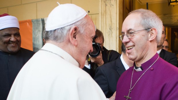 Interfaith encounter: Pope Francis, left, greets Justin Welby, Archbishop of Canterbury.