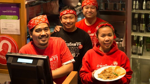Staff at Wok On Inn, which voluntarily displays its hygiene and food safety rating.