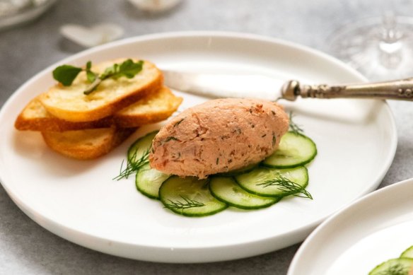 A quenelle of trout rillettes with cucumber and crostini.